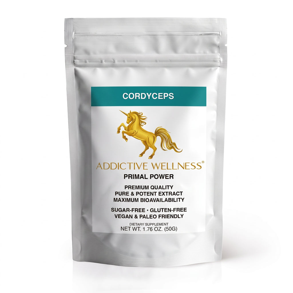 A silver stand-up pouch of Addictive Wellness Cordyceps Primal Power dietary supplement, featuring a teal label and a gold unicorn logo on a white background.