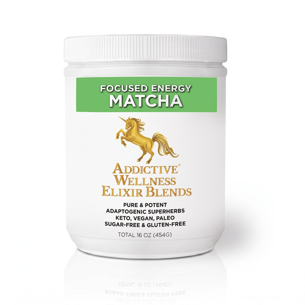 A white plastic jar of Addictive Wellness Elixir Blends Focused Energy Matcha, featuring a green and gold label with a unicorn graphic, on a white background with a soft reflection.