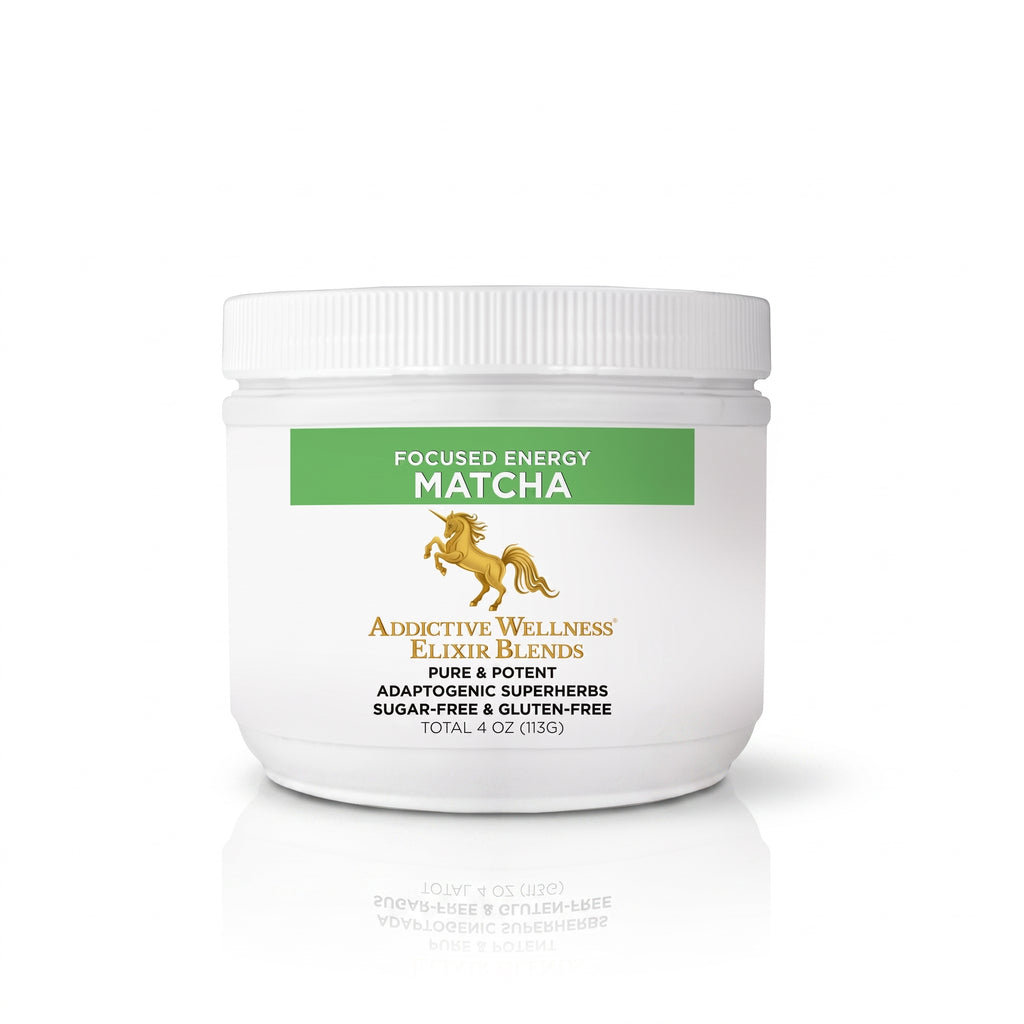 A white plastic jar of Addictive Wellness Elixir Blends Focused Energy Matcha, featuring a green and gold label, on a clean white background with a soft reflection.